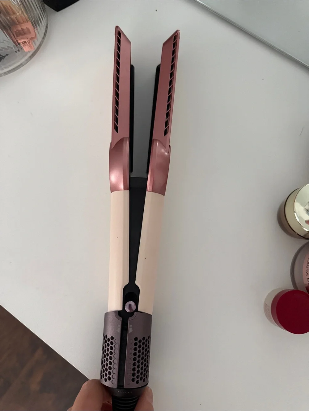 Dyson hair straightener in blush and rose gold
